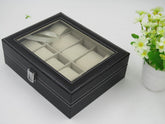 Black PU leather watch storage box with 10 compartments and a clear top.