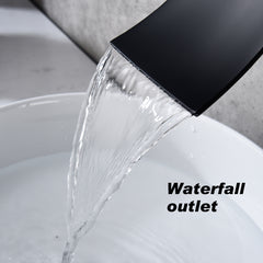 Matte black wall-mount bathroom waterfall faucet with cascading water flow into sink.