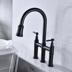 Matte black pull-down double-handle kitchen faucet with bridge design and sprayer.