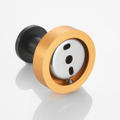 A pack of four black and gold round-base wall-mount towel hooks.