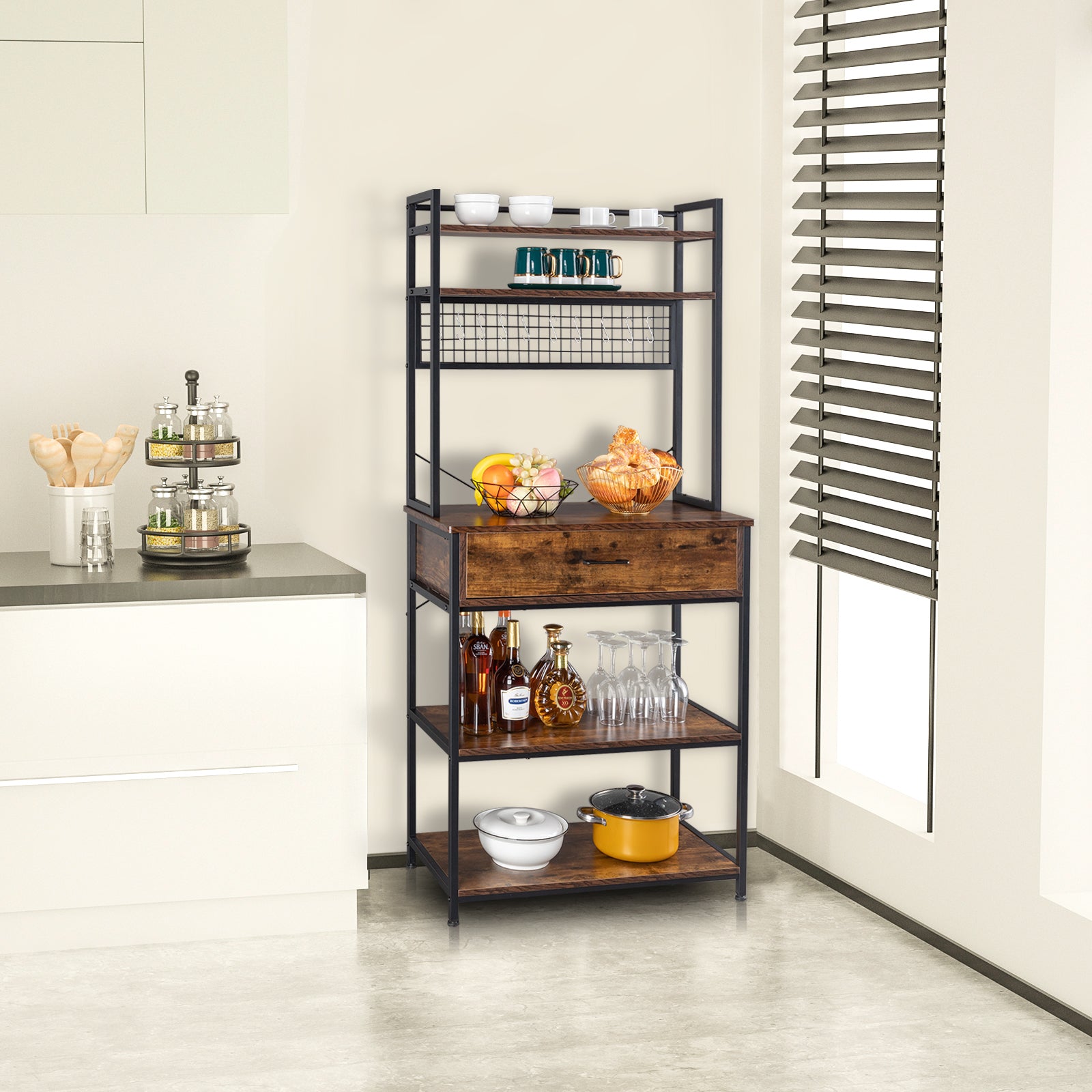 Rustic brown 5-tier industrial bakers rack with metal frame, shelves, drawers, and hooks in a kitchen.
