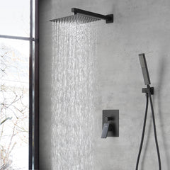 Matte black wall-mounted shower system with 10-inch rain head and handheld sprayer.