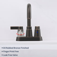 Oil rubbed bronze 2-handle bathroom sink faucet with 360-degree swivel spout.