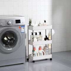 White 3-layer storage cart with stainless steel frame and wheels next to a washing machine.