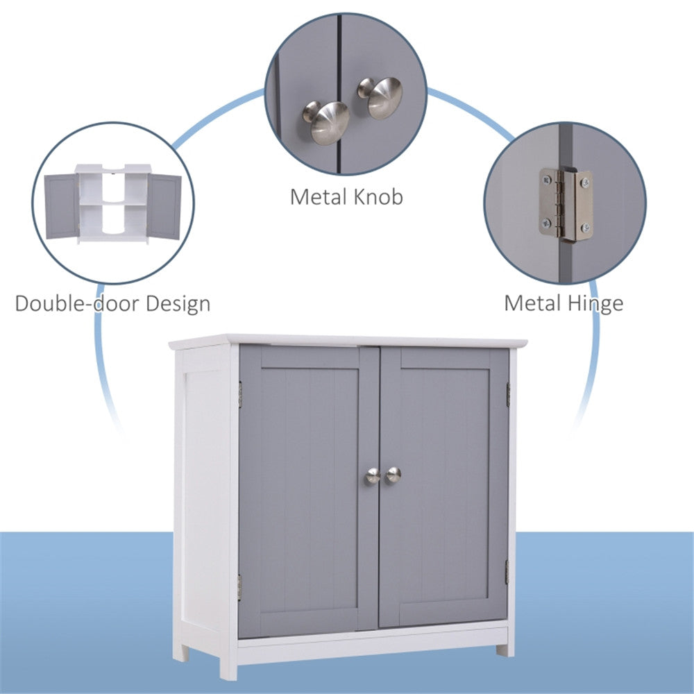 A white and gray under-sink bathroom storage cabinet with double doors, metal knobs, and hinges.