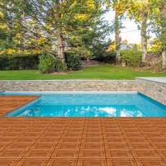 27 natural pine interlocking deck tiles forming a wooden platform around a blue pool.