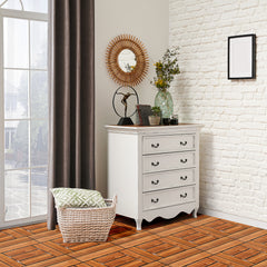 White wooden interlocking deck tiles installed on a sunny balcony floor.