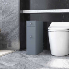 Gray MDF slide-out bathroom storage cabinet beside a white toilet on a tiled floor.
