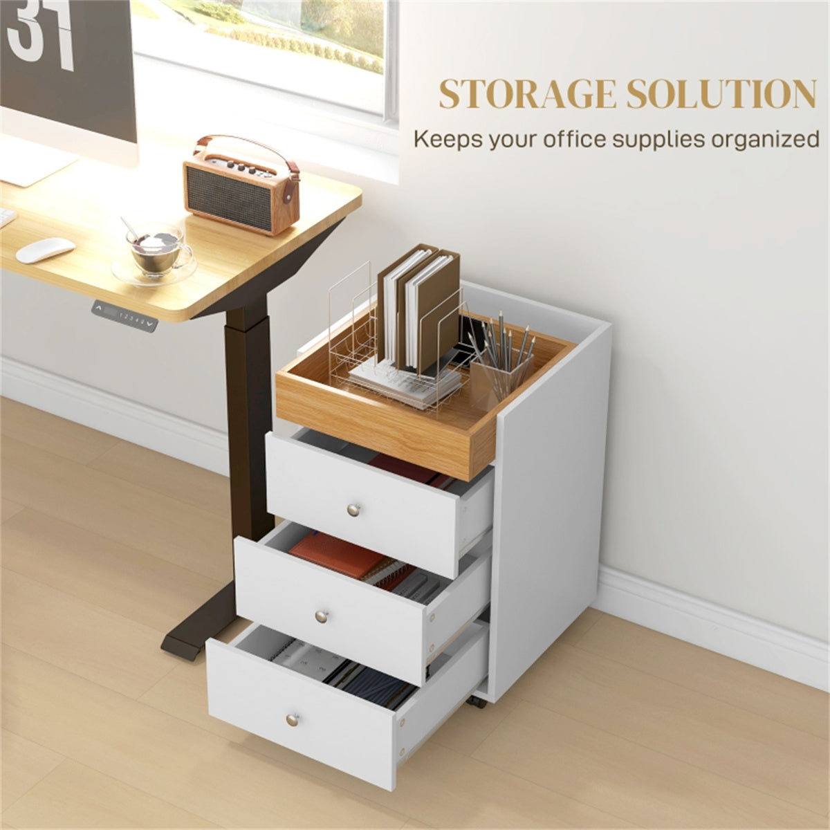 White melamine bathroom storage cabinet with three drawers and a lift-out tray on casters.