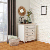 Light brown interlocking plastic deck tiles forming a tiled floor in a bright room corner.