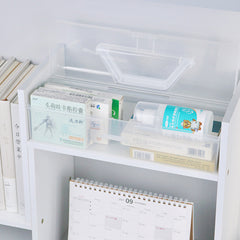 Clear stackable plastic storage box for 1500 trading cards, shown with contents.