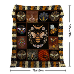 A 50x60 inch flannel velvet throw blanket with a bee and floral pattern in black, orange, and gold tones.