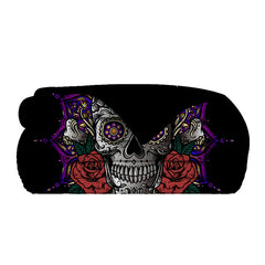 A black flannel throw blanket features a detailed sugar skull and red roses design.