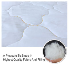 White queen comforter with black and gold geometric cube pattern, reversible, and two shams.