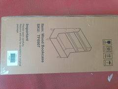 White MDF kids bookshelf with open shelves and toy storage bin on pine legs.