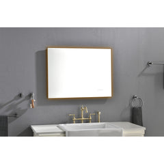 A 32x24 inch rectangular LED backlit bathroom mirror with wooden frame mounted above a white sink on a gray wall.