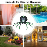 A black and green inflatable spider with LED lights, shown in various settings.