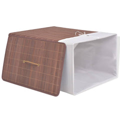 Rectangular brown bamboo laundry hamper with removable white liner and side handle.