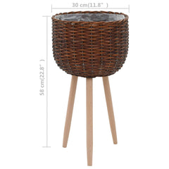 Brown wicker planter with PE lining and beech wood feet, 30 cm diameter.