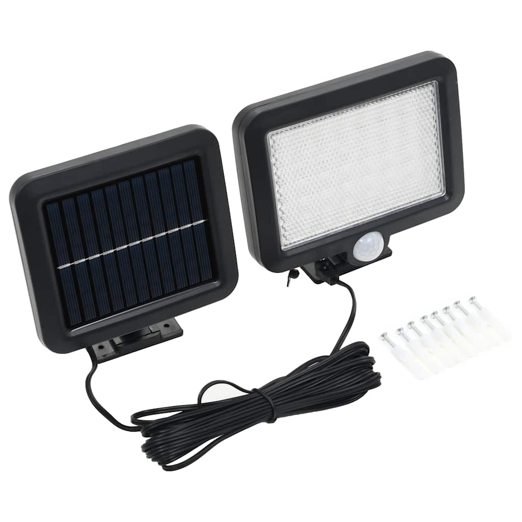 Black solar-powered LED floodlight with motion sensor, white light panel, and mounting screws.