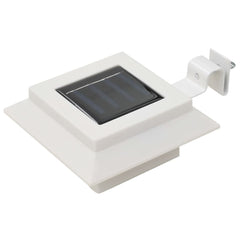 White square LED solar outdoor light with bracket, 4.7 inches.