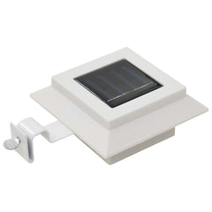 White square LED solar outdoor light with bracket, 4.7 inches.