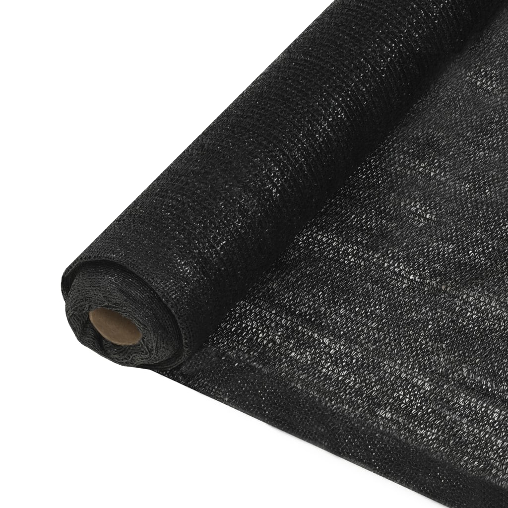 Rolled black HDPE privacy net, 6.6 feet by 32.8 feet, UV proof.
