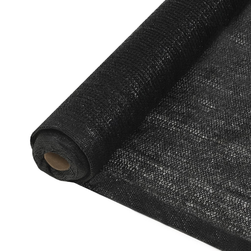 Rolled black HDPE privacy net, 6.6 feet by 82 feet, UV proof.