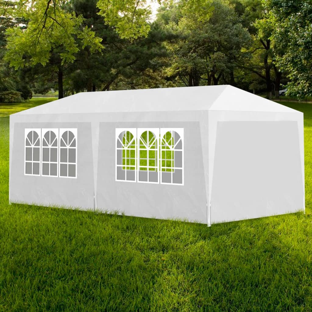 White 10'x20' party tent with steel frame, arched window panels, and zippered door on green grass.
