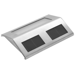 Four stainless steel solar-powered stair lights with angled design and solar panels.