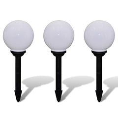 Three white glossy ball solar pathway lights with black stakes.