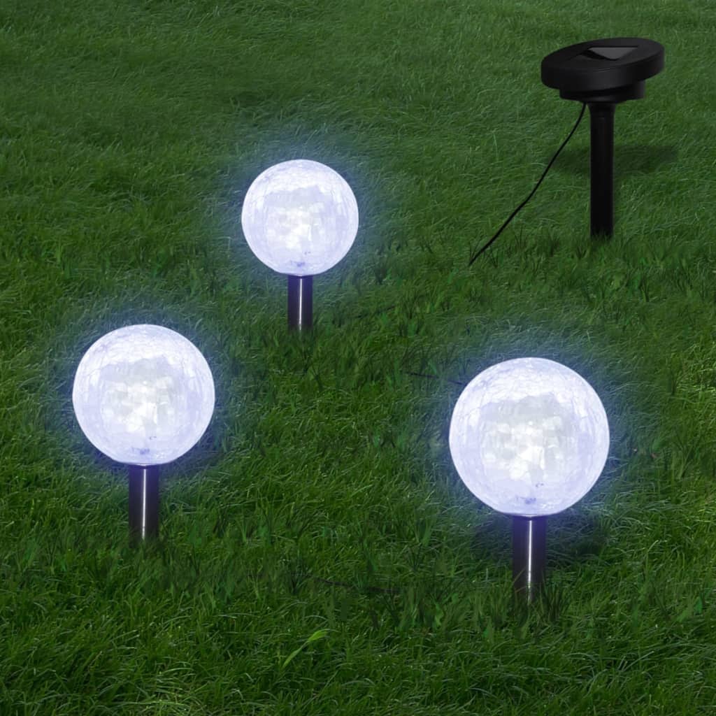 Three solar-powered LED garden bowl lights with ground spikes for easy installation.