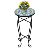Green and white ceramic mosaic side table with curved iron legs, 23.6 inches tall.