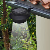 Six black solar LED fence gutter lights, each with three LEDs and mounting brackets.