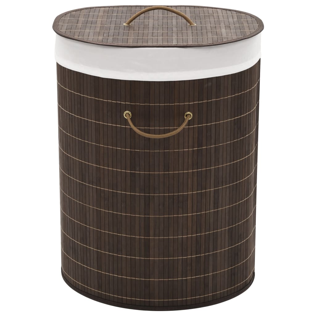 Dark brown oval bamboo laundry hamper with removable liner and sturdy handles.