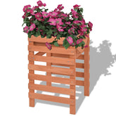 Beige Chinese fir wood planter, 15x14.2x23.6 inches, elevated with slatted sides and pink flowers.