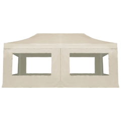 Cream 20'x10' folding party tent with aluminum frame and PVC window walls.