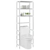 Silver stainless steel 3-tier over-toilet storage rack, 66.5 inches tall, with shelves holding towels and toiletries.