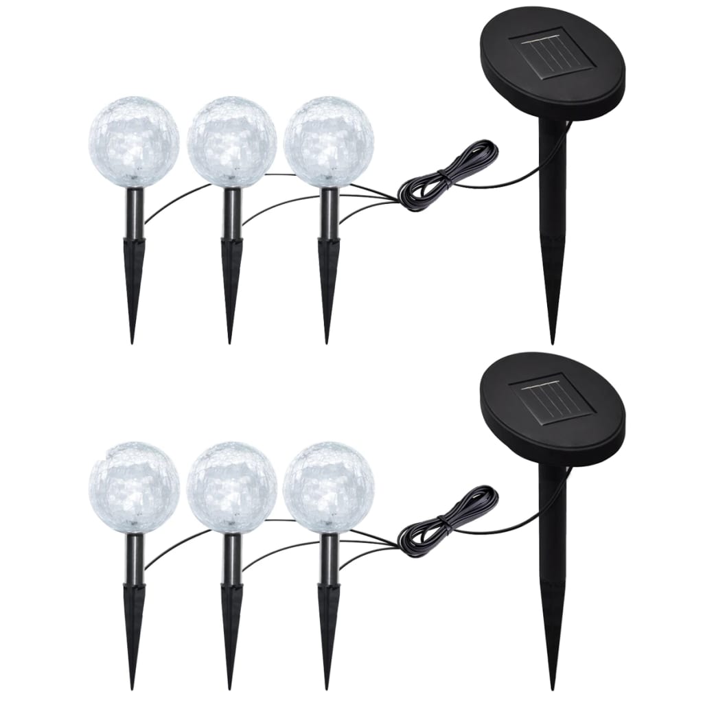 Six-pack of solar LED ball garden lights with frosted glass orbs and black spikes.