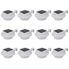 12-pack of white outdoor solar LED fence lights with mounting brackets.