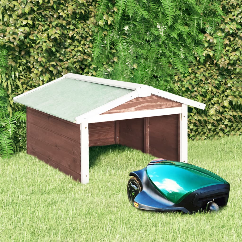 A mocha and white firwood robotic lawn mower garage with a green mower positioned in front on grass.