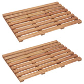 Two rectangular acacia wood bath mats with slatted designs are shown on a white background.
