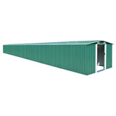 Green galvanized steel garden shed with double sliding doors and ventilation vents.