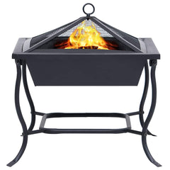 Black powder-coated steel fire pit with spark screen and burning flames on sturdy legs.