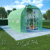 Green PE mesh fabric greenhouse, 11.3x6.6x6.6 ft, with steel frame, windows, door, and plants inside on a lawn.
