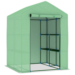 A green steel greenhouse with shelves and a rolled-up front door.