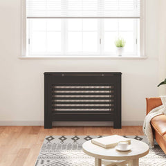 Black MDF radiator cover with slats and top shelf in a modern living room.