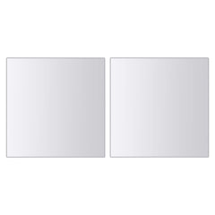 16-piece frameless glass mirror tiles set in square, oval, and S-shapes.
