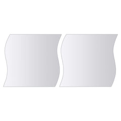 16-piece frameless glass mirror tiles set in square, oval, and S-shapes.