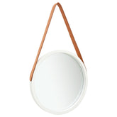 A 15.7-inch round white wall mirror with an adjustable faux leather strap for hanging.